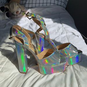 Holographic dolls kill heels